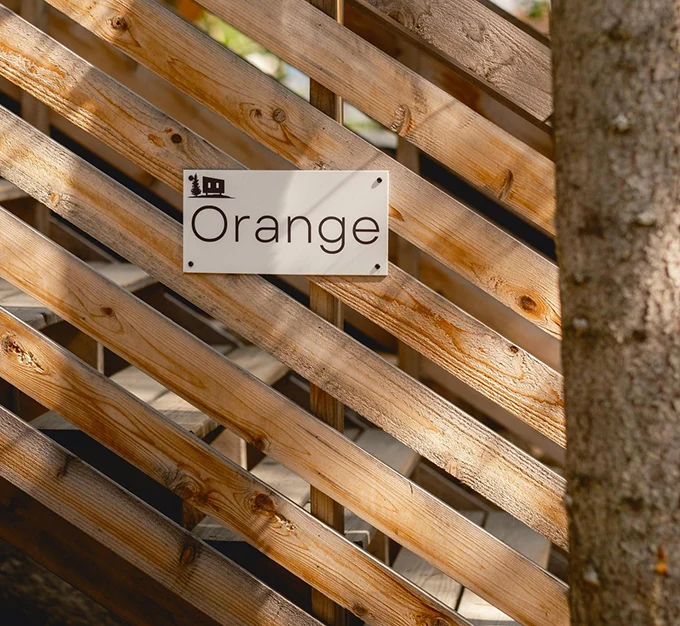 Orange Cabin Sign and Entrance