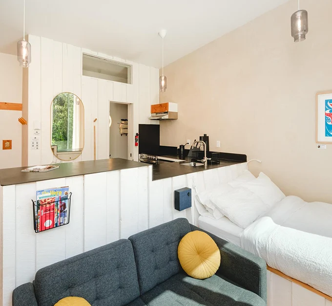 Orange Door Interior with Living and Sleeping Area