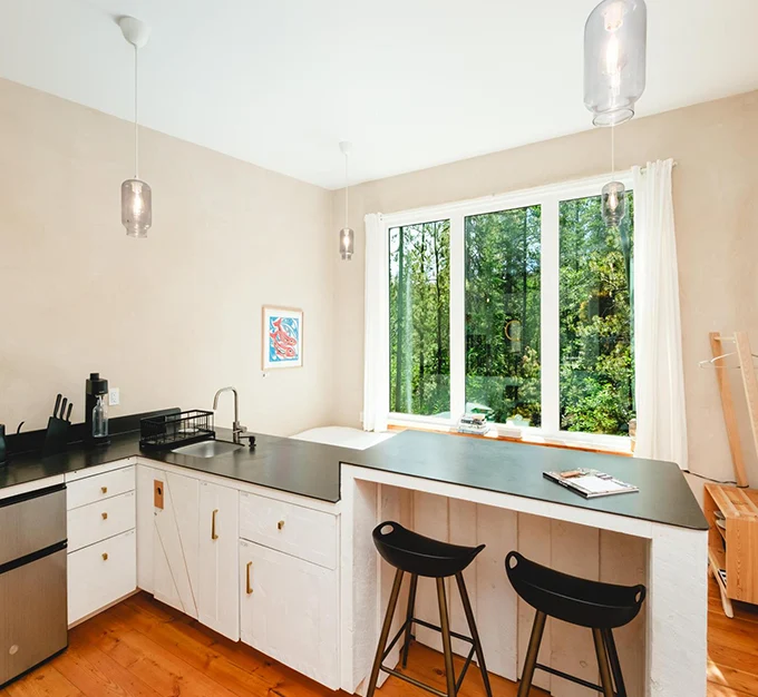 Orange Door Kitchen and Dining Area with Forest View