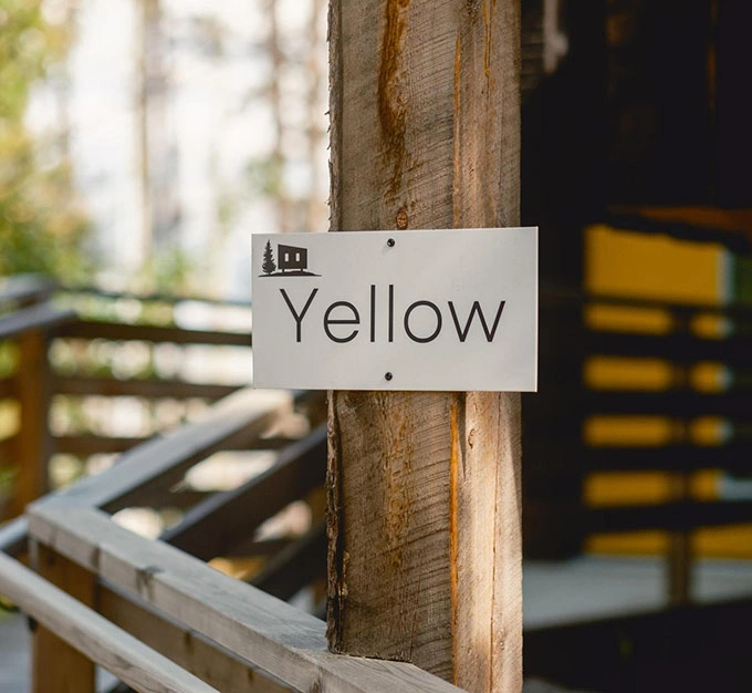 Yellow Cabin Sign and Entrance