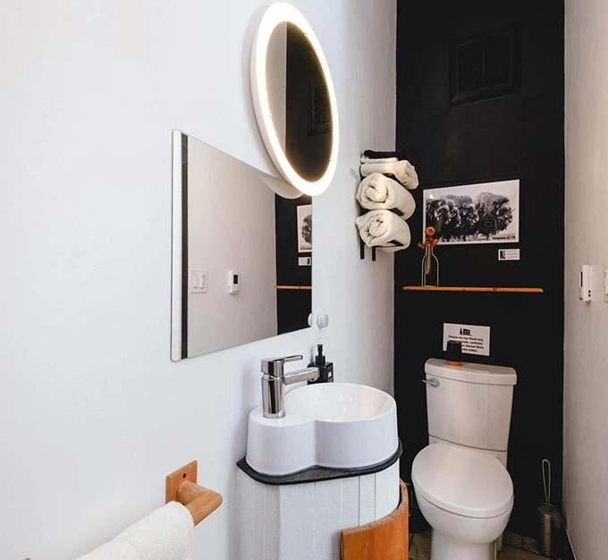 Yellow Door Bathroom with Sink and Vanity