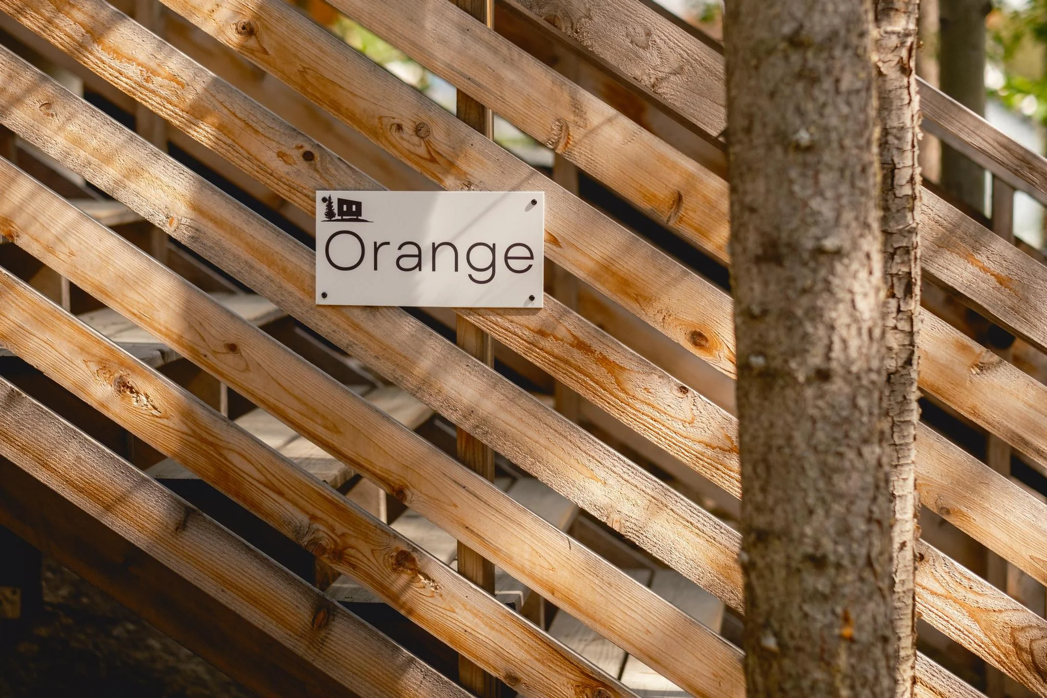 Orange Cabin Sign and Entrance