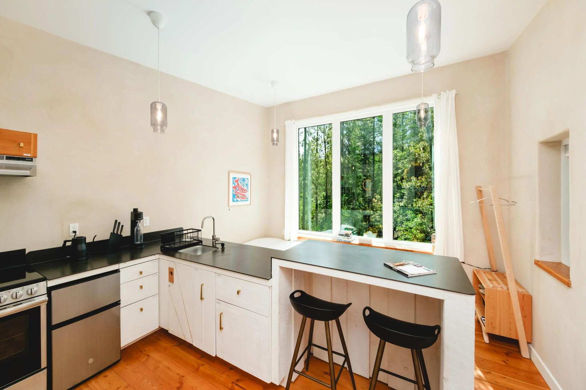 Orange Door Kitchen and Dining Area with Forest View