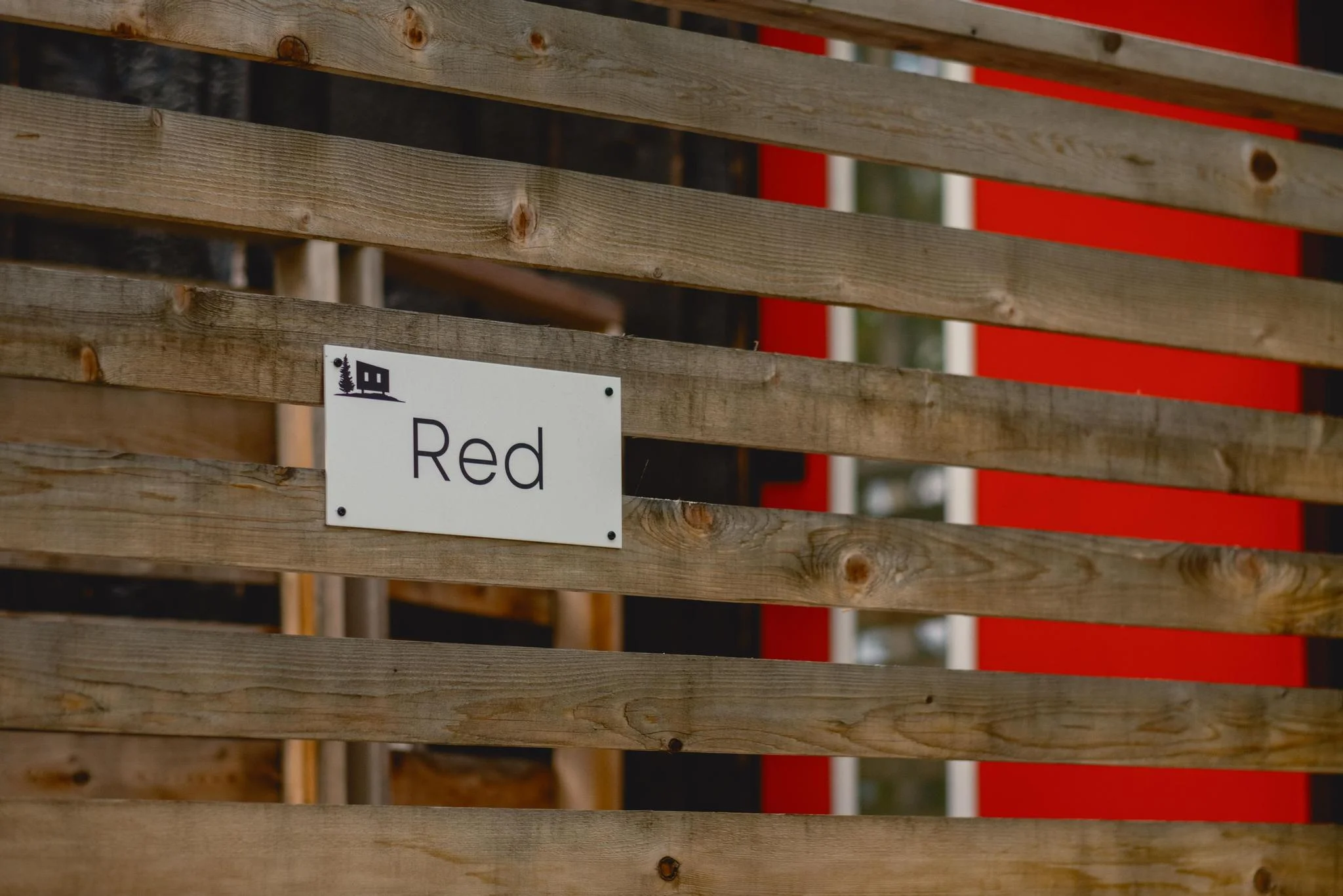 Red Cabin Sign and Entrance