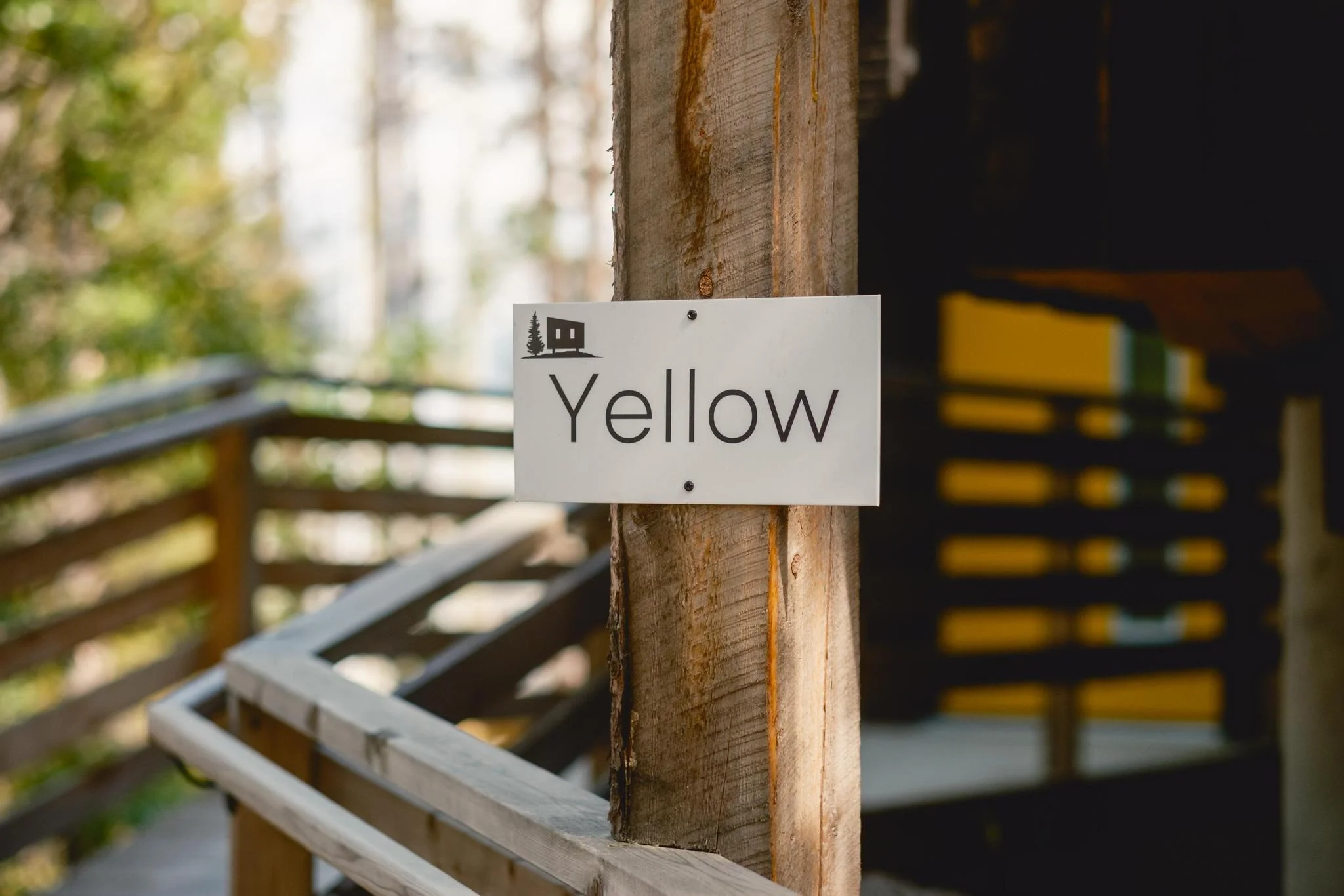 Yellow Cabin Sign and Entrance
